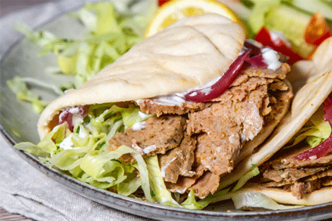 sizzling doner kebabs with fresh vegetables in a pitta bread served at Fish Plus Chips Takeaway in Ayr